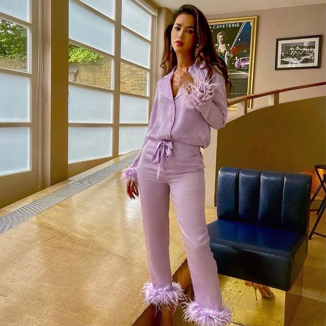 Conjunto de dos piezas con plumas