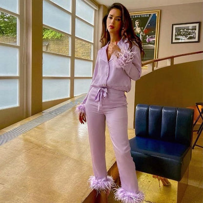 Conjunto de dos piezas con plumas