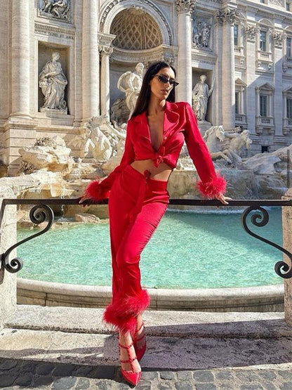 Conjunto de dos piezas con plumas